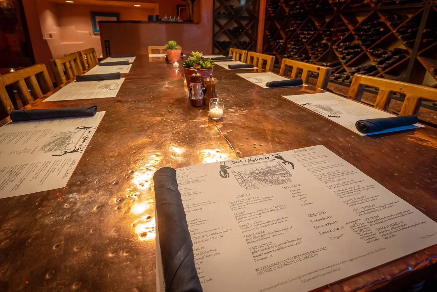 A long copper table in Dick’s Hideaway’s private dining room